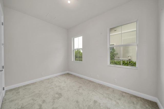 view of carpeted spare room