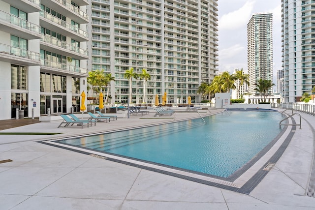 pool featuring a patio area