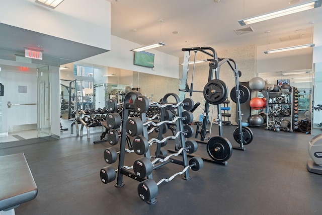 gym featuring visible vents