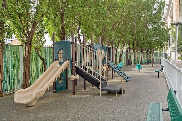 community play area featuring fence