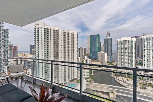 balcony featuring a city view