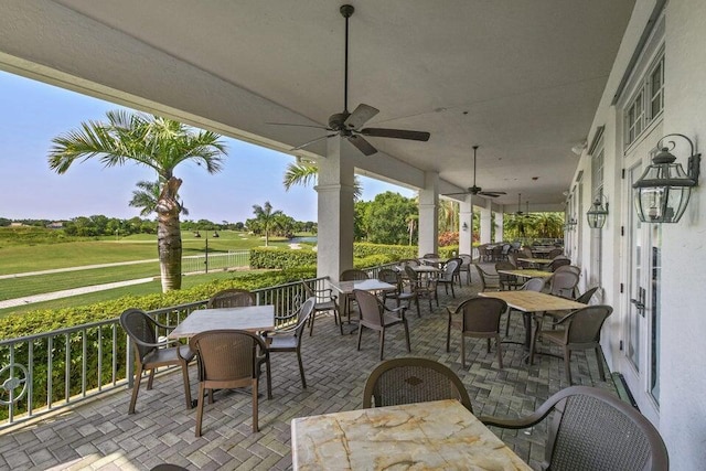 view of patio / terrace featuring ceiling fan