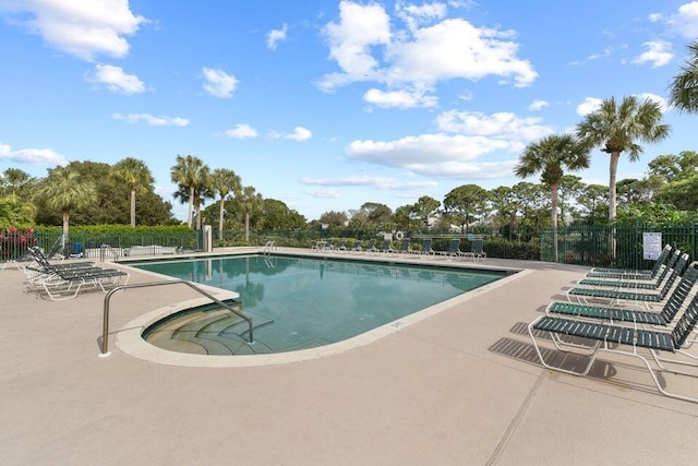 view of pool featuring a patio