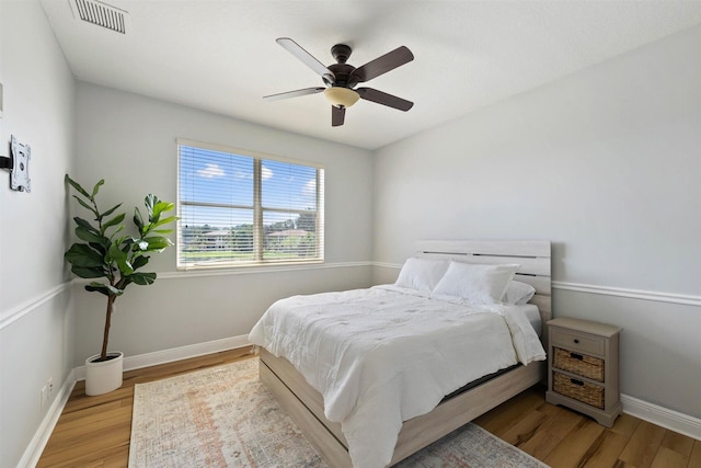 bedroom featuring ceiling fan and light wood-type flooring