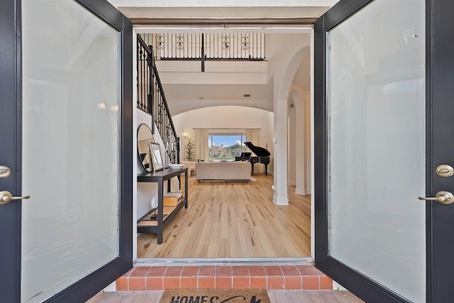 foyer entrance with wood-type flooring