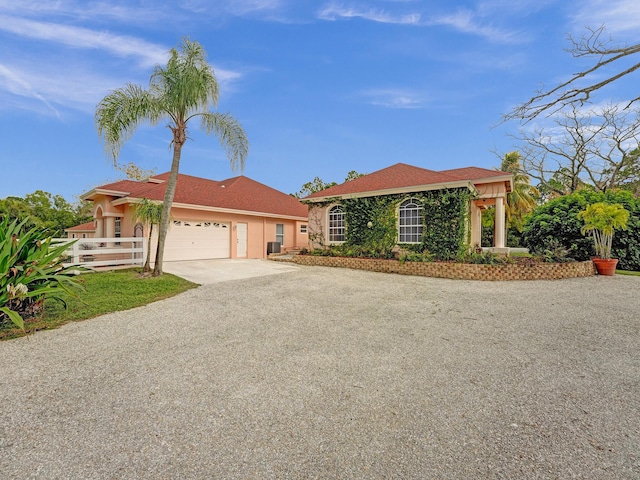 view of front of home with a garage