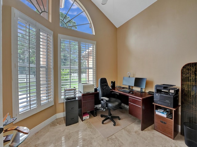 home office with high vaulted ceiling