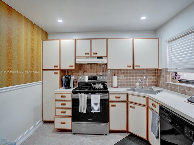 kitchen featuring decorative backsplash, white cabinets, stainless steel electric range oven, dishwasher, and sink