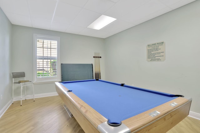 game room featuring hardwood / wood-style flooring, a drop ceiling, and pool table