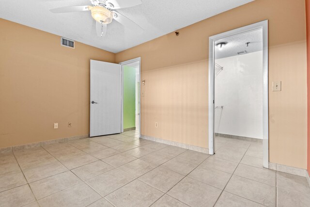 bathroom featuring toilet, vanity, and a shower with shower door