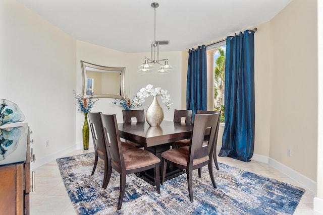 dining room featuring light tile patterned floors