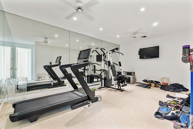 workout room with carpet flooring and ceiling fan