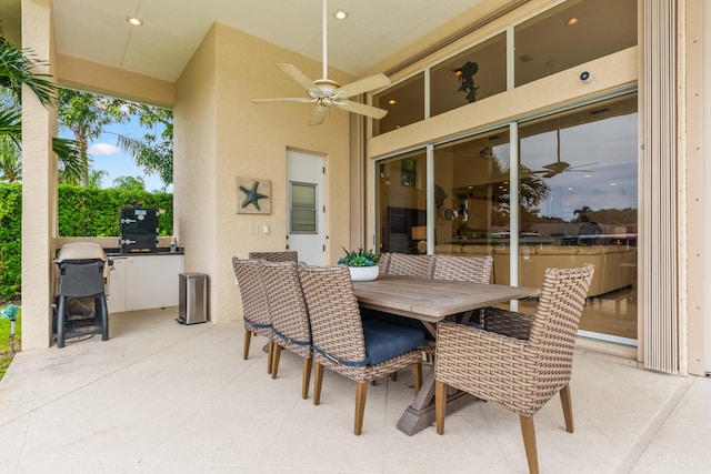 view of patio with ceiling fan