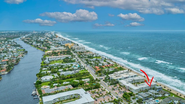 aerial view with a view of the beach and a water view