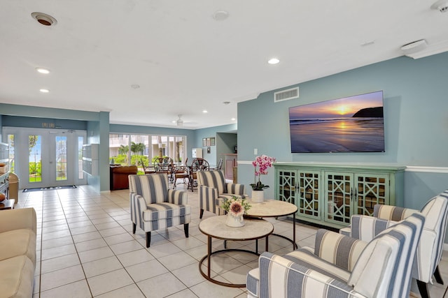 living room with light tile patterned floors and french doors