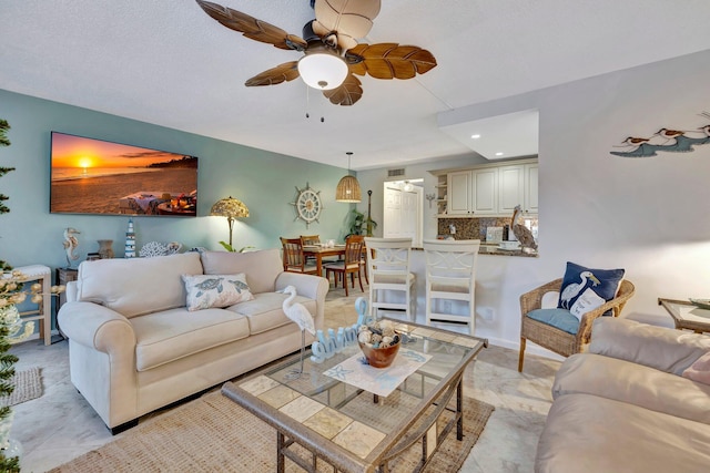 living room with ceiling fan