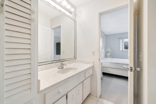 bathroom featuring tile patterned floors and vanity