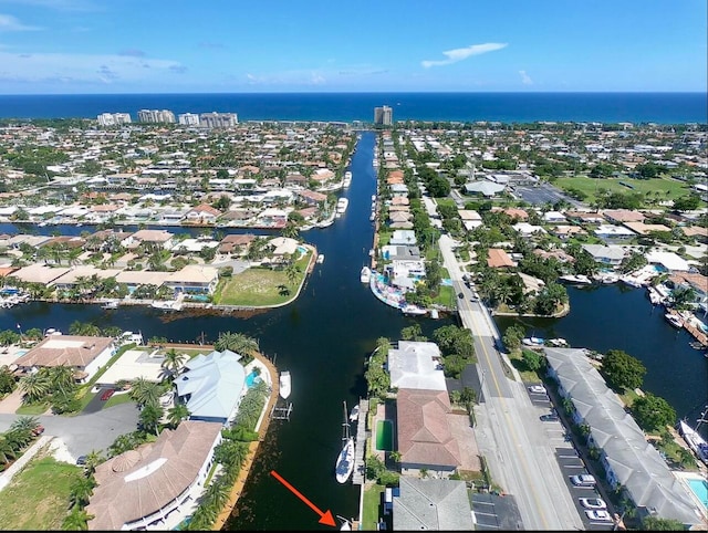 drone / aerial view featuring a water view