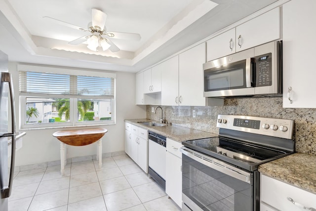 kitchen featuring white cabinets, sink, and stainless steel appliances