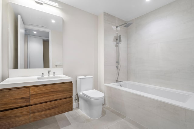 full bathroom featuring vanity, toilet, tiled shower / bath combo, and tile patterned flooring