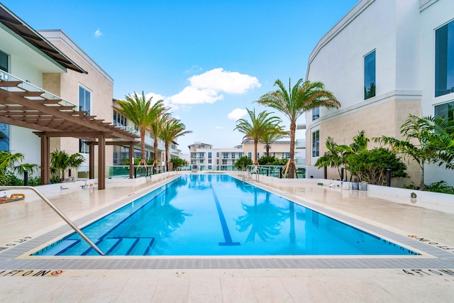 view of pool featuring a pergola and a patio area