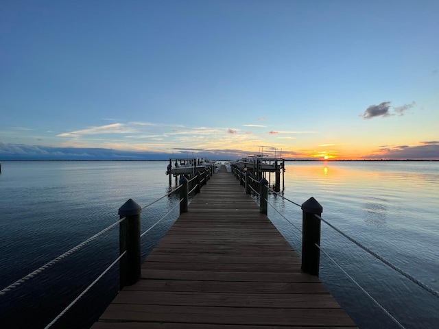 dock area featuring a water view