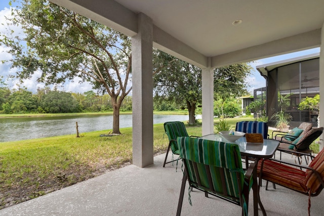 view of patio featuring a water view