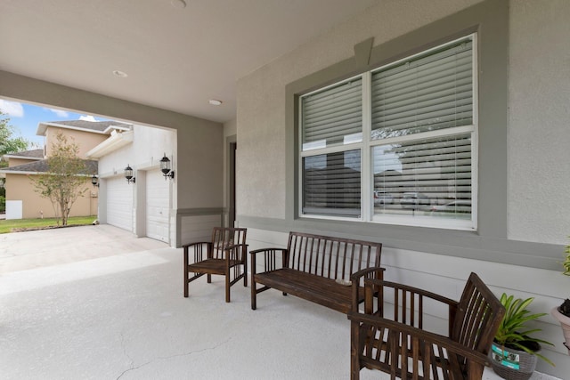 view of patio with a garage