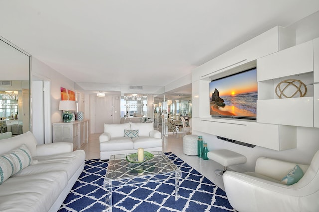 living room with an inviting chandelier