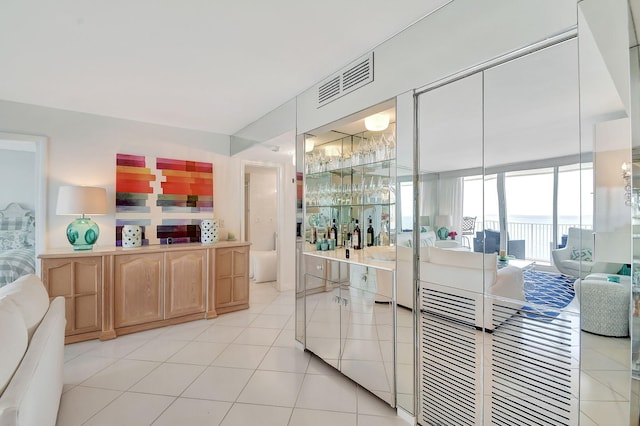 kitchen with light tile patterned flooring