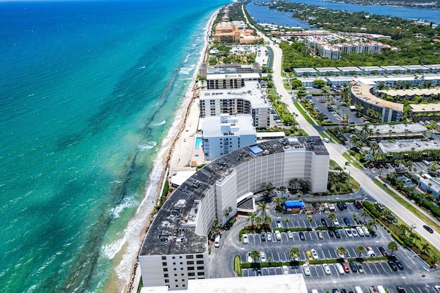 bird's eye view with a view of the beach and a water view