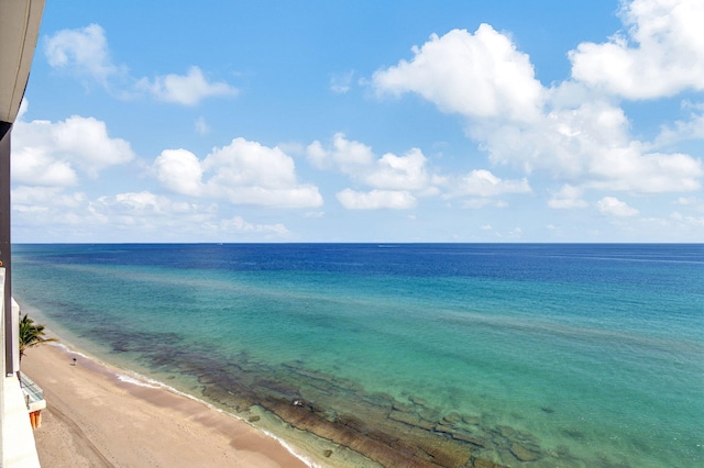 view of water feature with a beach view