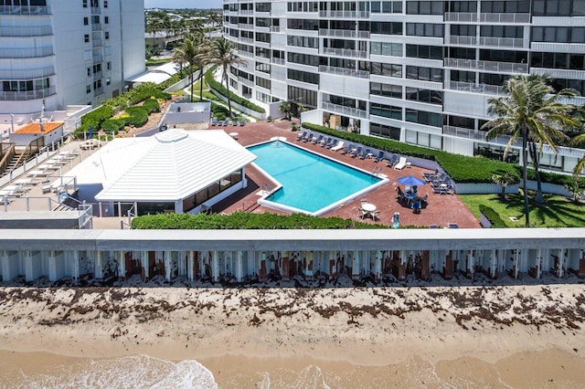 view of swimming pool with a water view