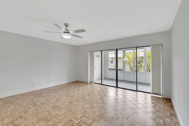 124 Capri C, Delray Beach, FL 33484 - spare room with baseboards and ceiling fan