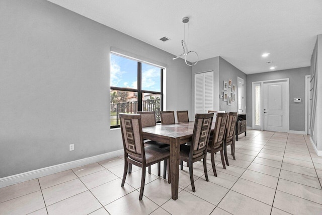 dining room with light tile patterned floors