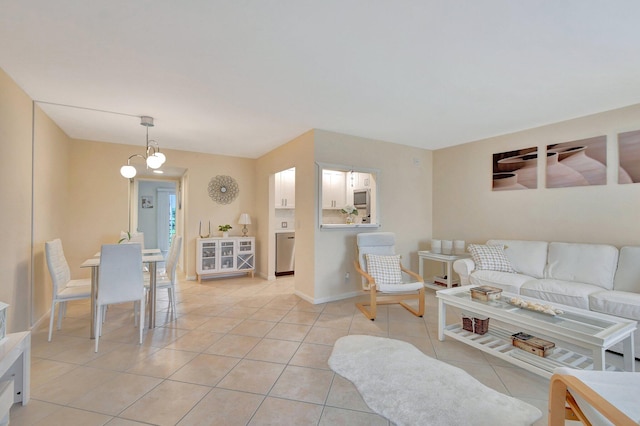 living area with light tile patterned floors and baseboards