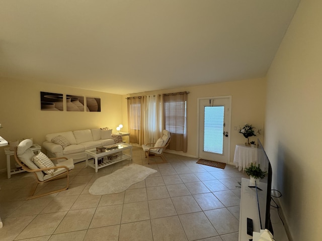 living room with light tile patterned floors