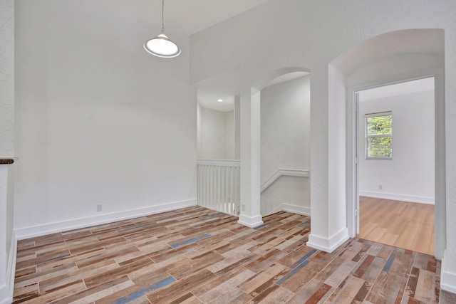 spare room featuring light hardwood / wood-style flooring