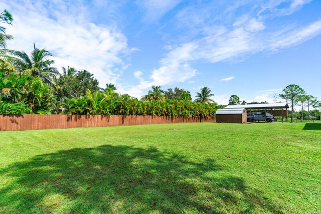 view of yard with a carport