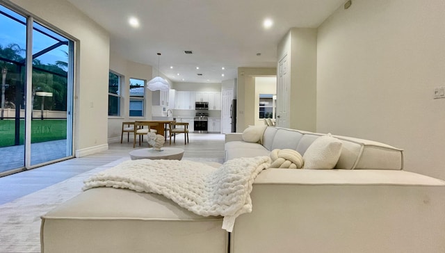 living room featuring light wood-type flooring