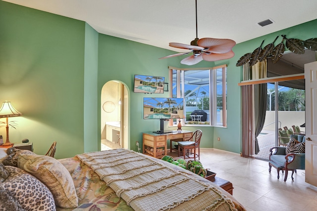 bedroom featuring access to exterior, ensuite bathroom, ceiling fan, and lofted ceiling