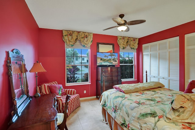 bedroom featuring ceiling fan and light tile patterned floors