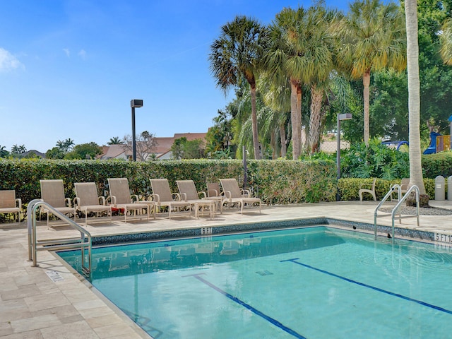 view of pool with a patio area