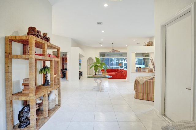 corridor featuring light tile patterned floors