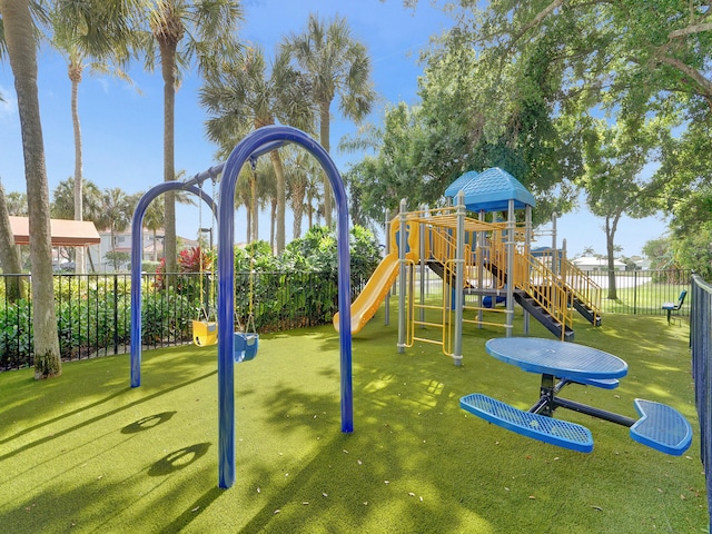 view of jungle gym featuring a yard