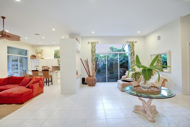 sitting room with light tile patterned floors