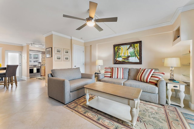 living room with ceiling fan, ornamental molding, and light tile patterned floors