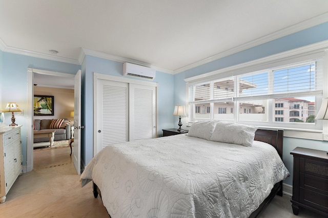 bedroom featuring ornamental molding, ensuite bathroom, and an AC wall unit