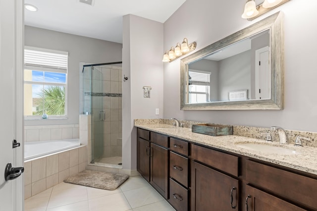 bathroom featuring vanity, separate shower and tub, and tile patterned flooring