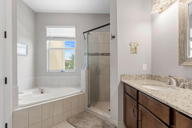 bathroom with vanity, shower with separate bathtub, and tile patterned floors